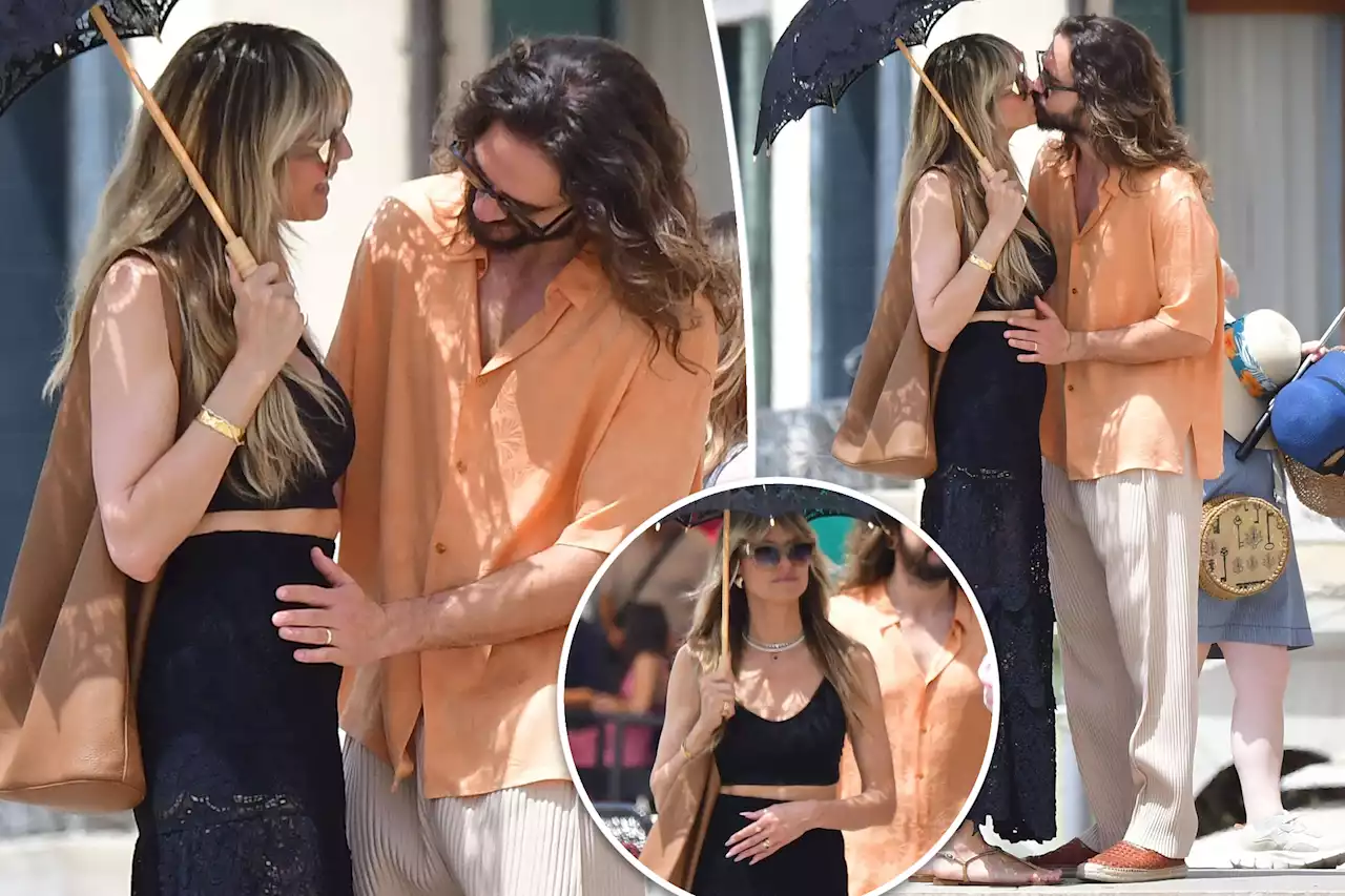 Heidi Klum, Tom Kaulitz can’t keep their hands off her stomach on Venice vacay