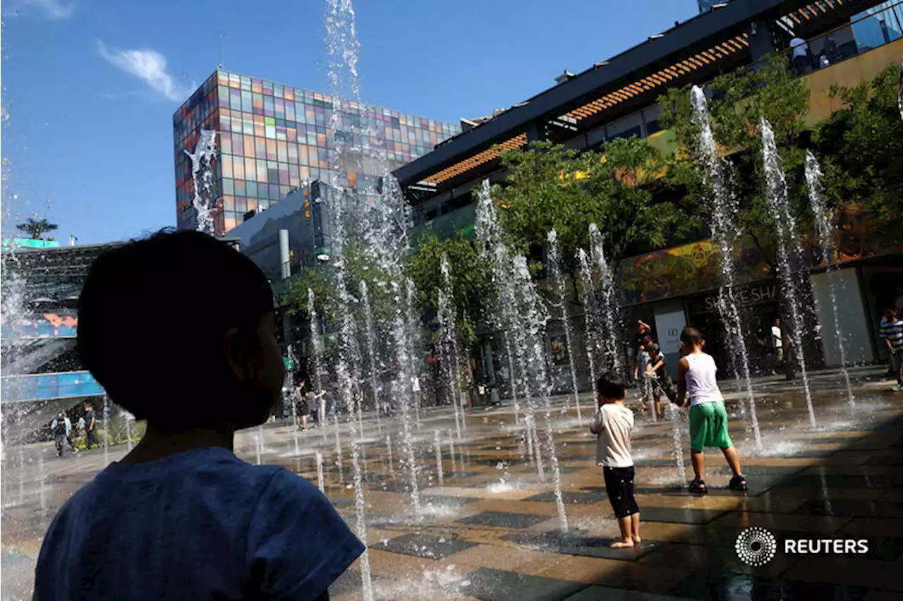 Beijing steps up hot weather alert to highest level