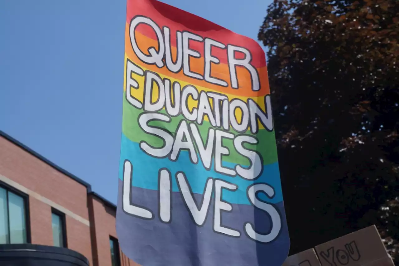 Anti-LGBTQ+ protesters outnumbered at school board demonstration