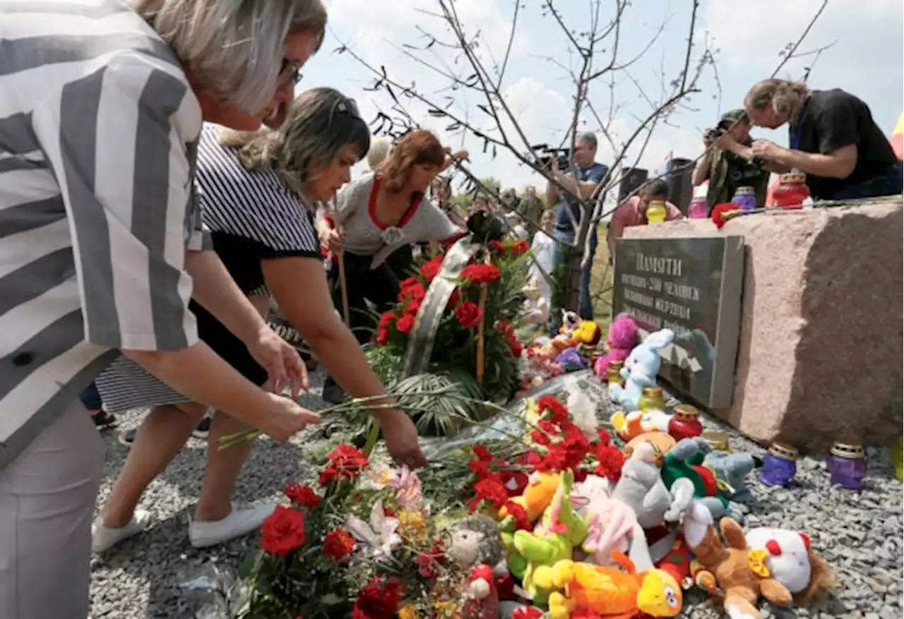 Australia imposes sanctions on three men over downing of Flight MH17