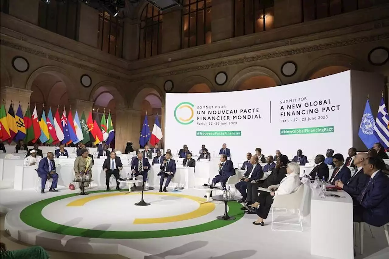 Paris finance summit breaks new ground in climate, poverty fight