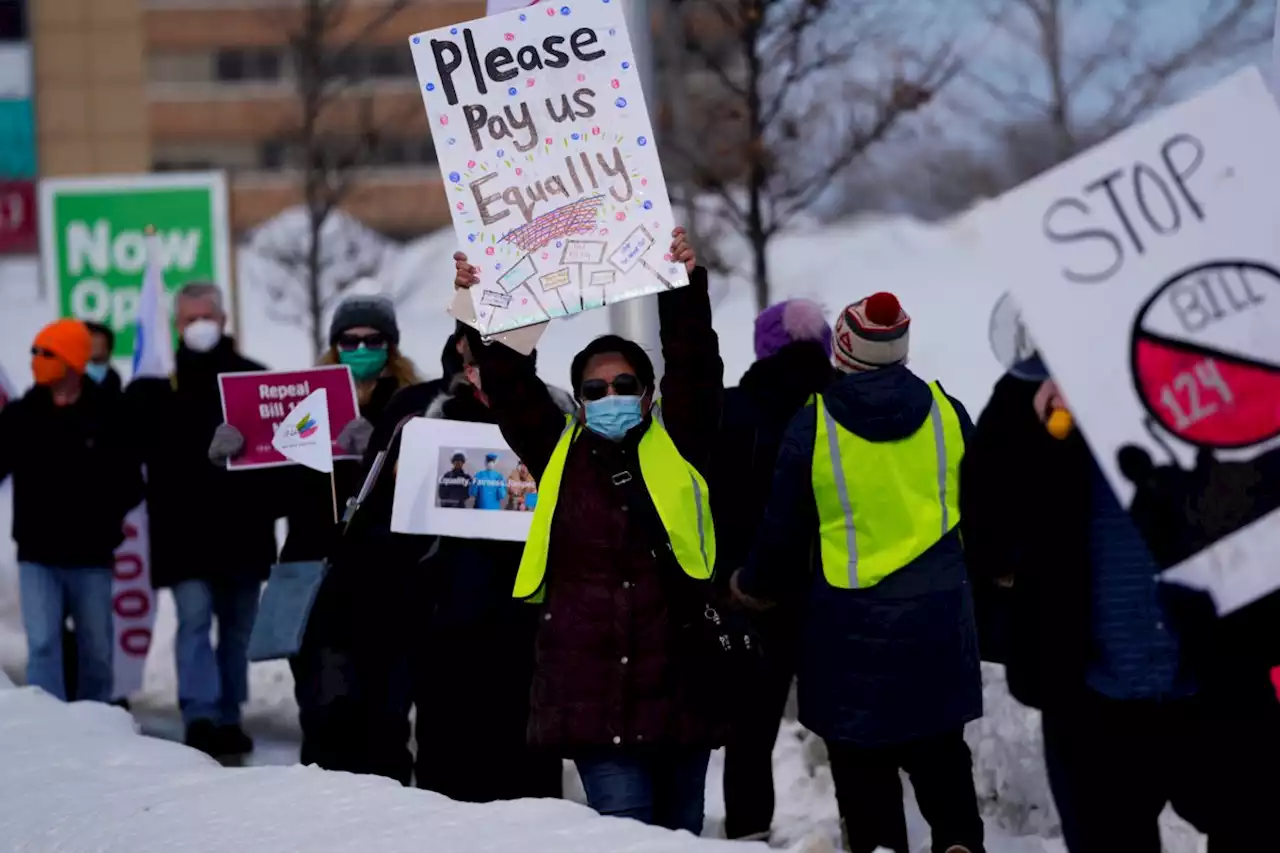 Bill 124 set back gender wage parity, unions argue