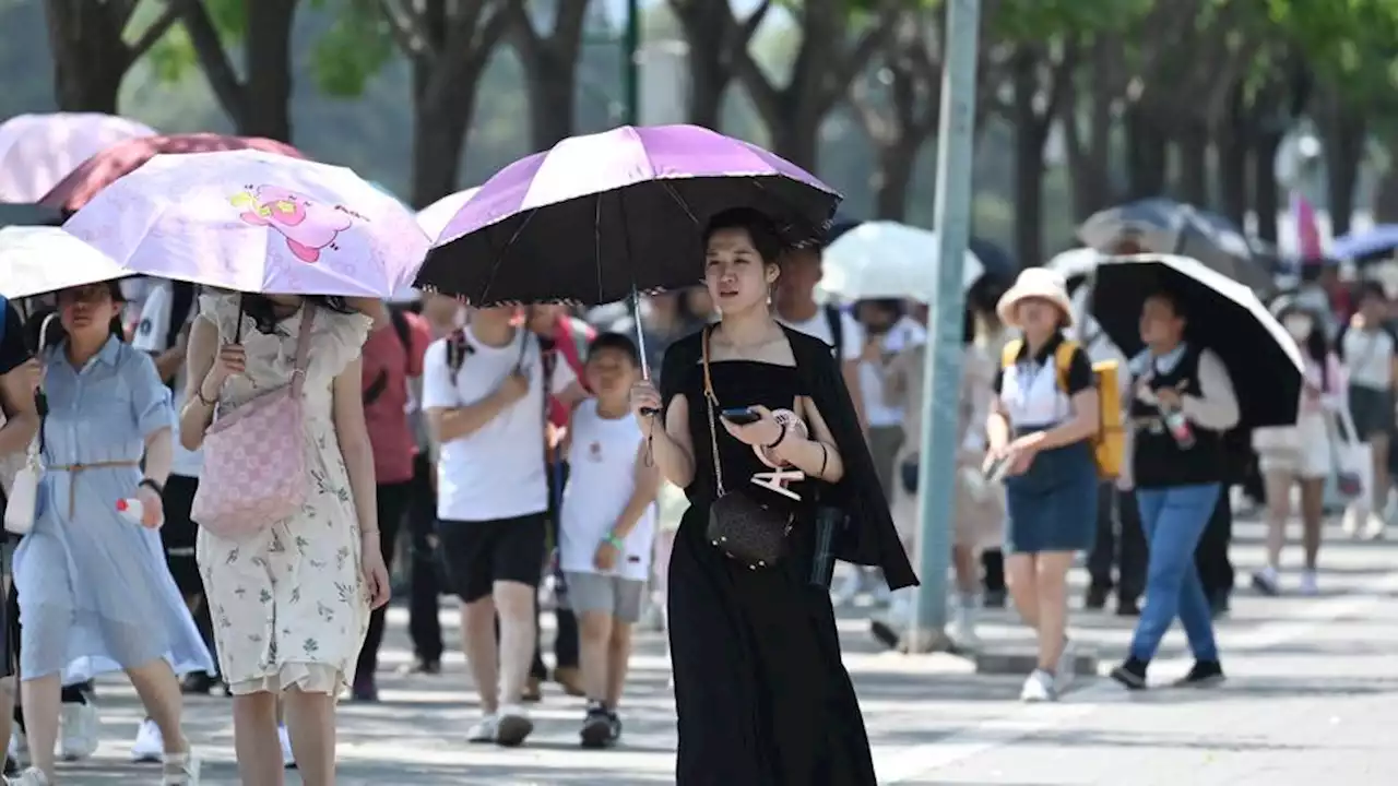 Beijing, northern China sizzle under nearly all-time-high temperatures