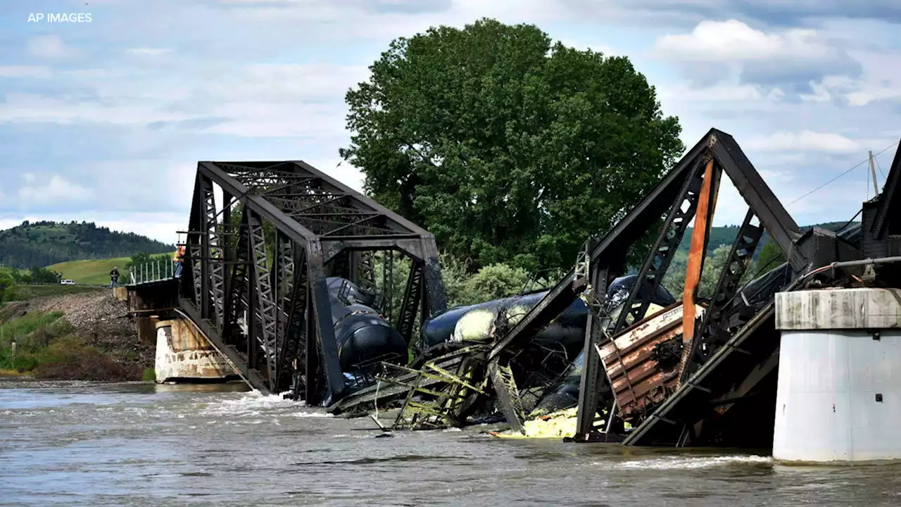 Freight train carrying hot asphalt, molten sulfur plunges into Yellowstone River as bridge fails