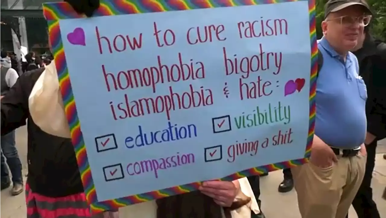 Counter-protesters push back against rally over Pride Month events in Calgary schools