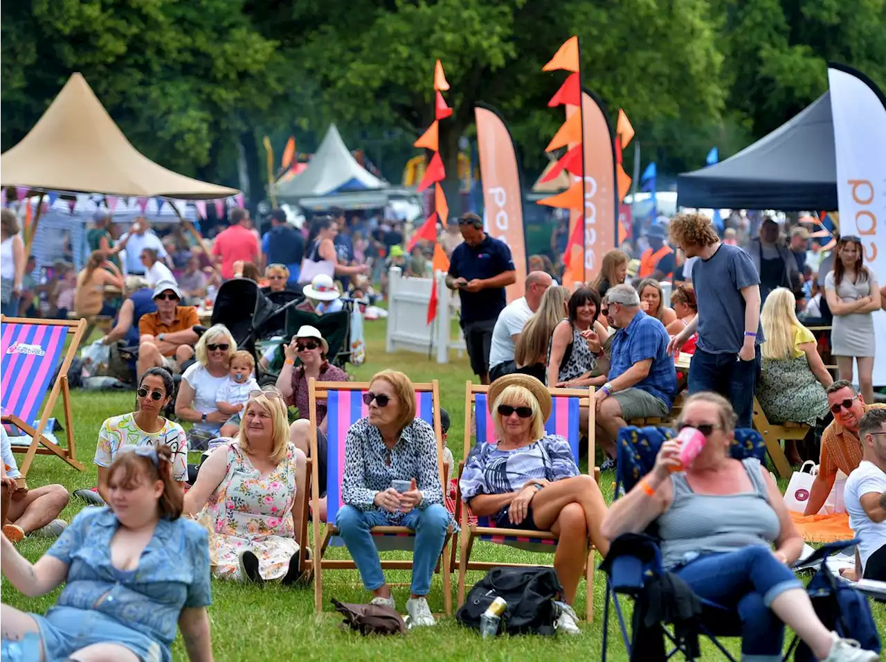 Foodies and fun lovers dashed for cover as thunderstorm rumbled over Shrewsbury Food Festival