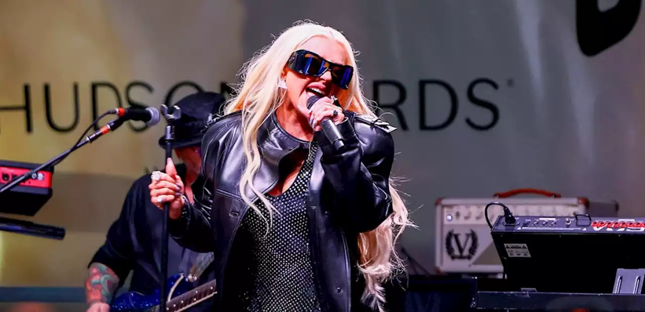 Christina Aguilera Gets Shady at Stonewall Day 2023 Concert in Versace Statement Sunglasses and Sparkling Jumpsuit for NYC Pride Performance