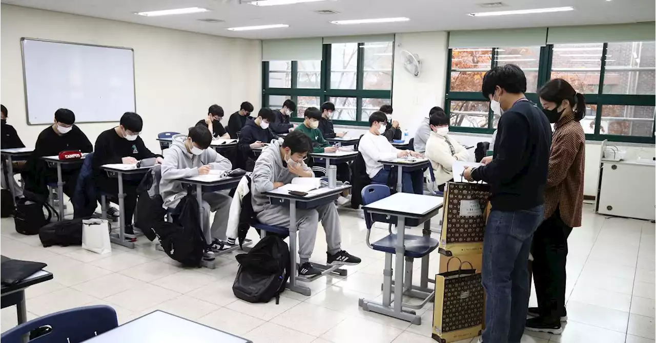 South Korea aims to curb private education spending, axe 'killer questions'