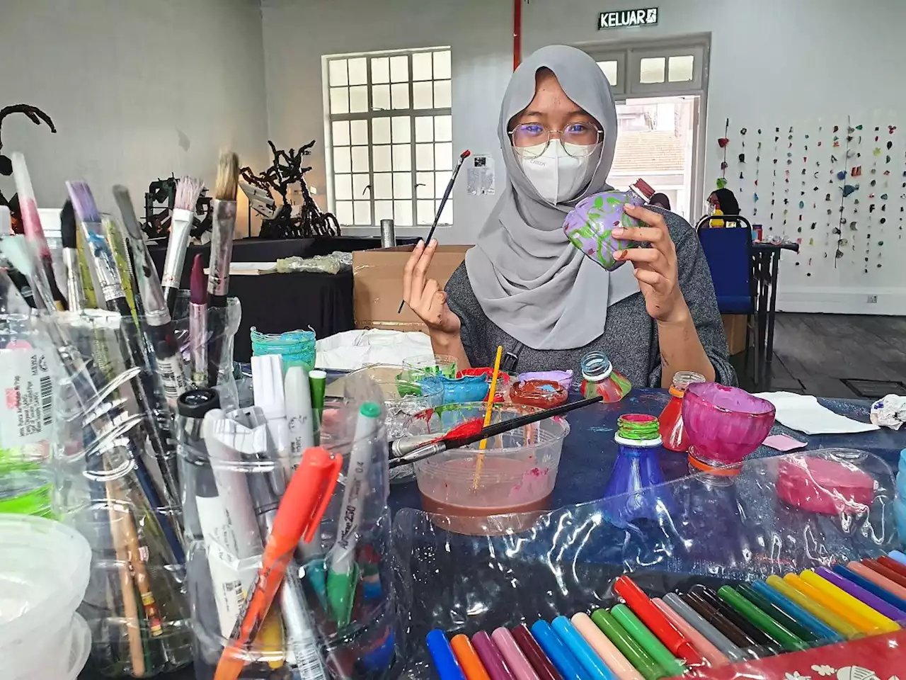 Malaysian students turn 1,000 plastic bottles into art for a greener future