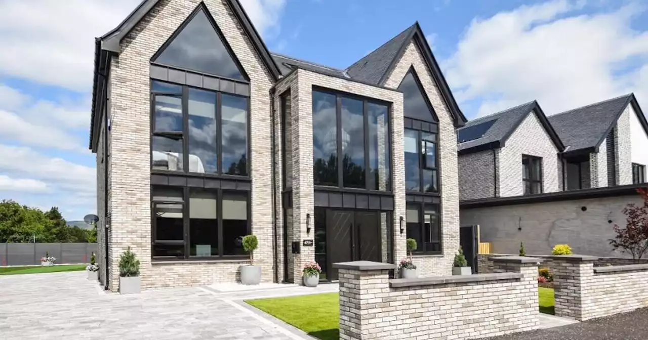 Stunning Scots golf inspired house with its own putting green up for sale