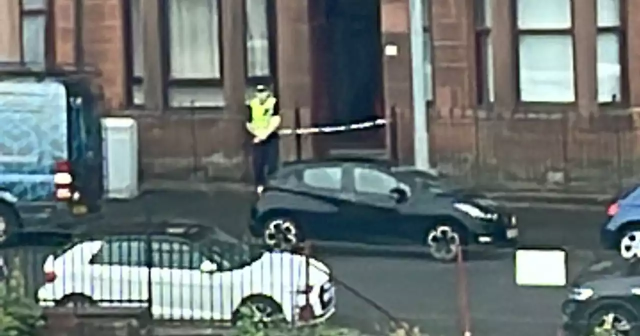 Police lockdown Glasgow east end street as man found 'seriously injured'