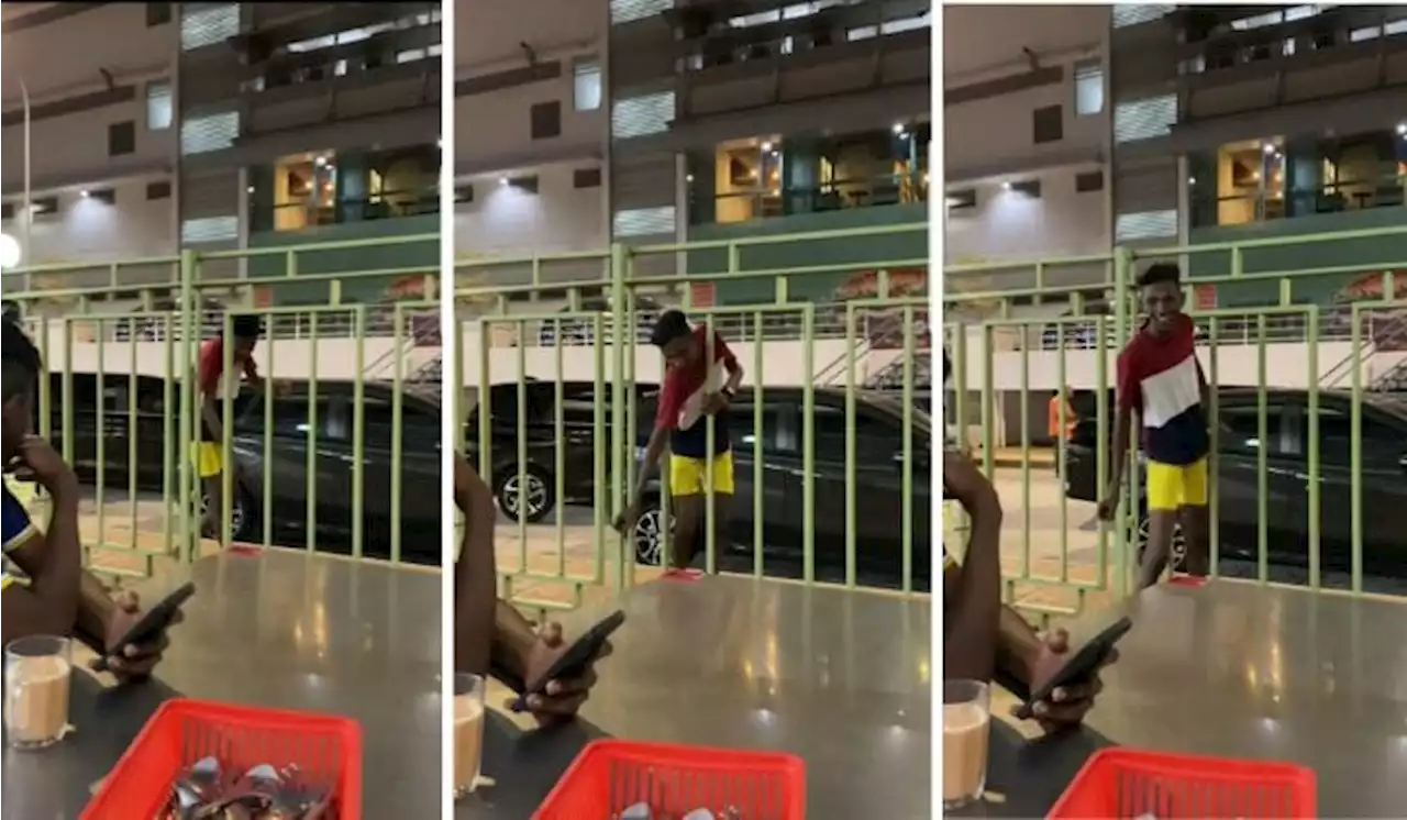 Young Man Makes It Through Narrow Railing At Klang Eatery, We Call It The Unintentional #KlangPagarChallenge | TRP