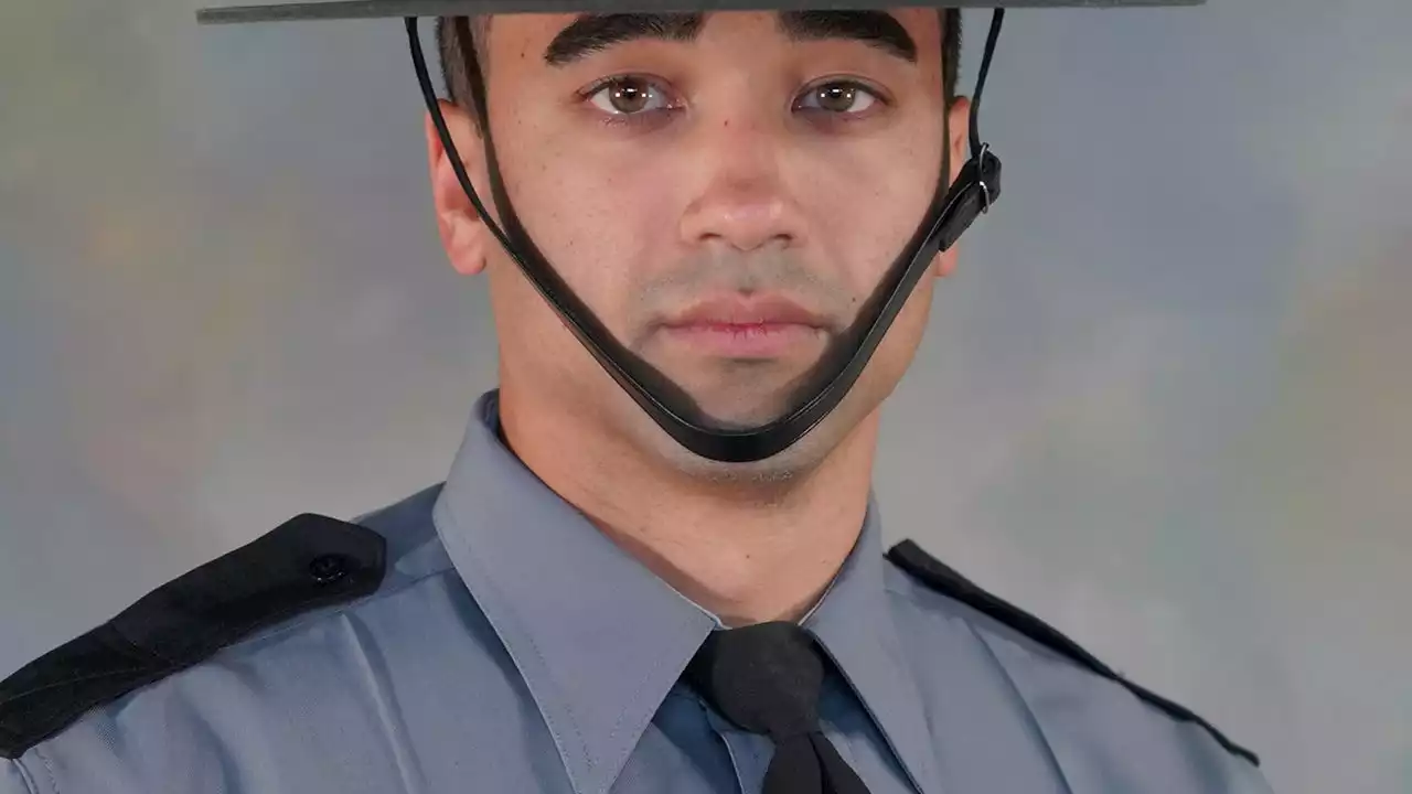 Pennsylvania state trooper killed in ambush is lauded as a hero during funeral service