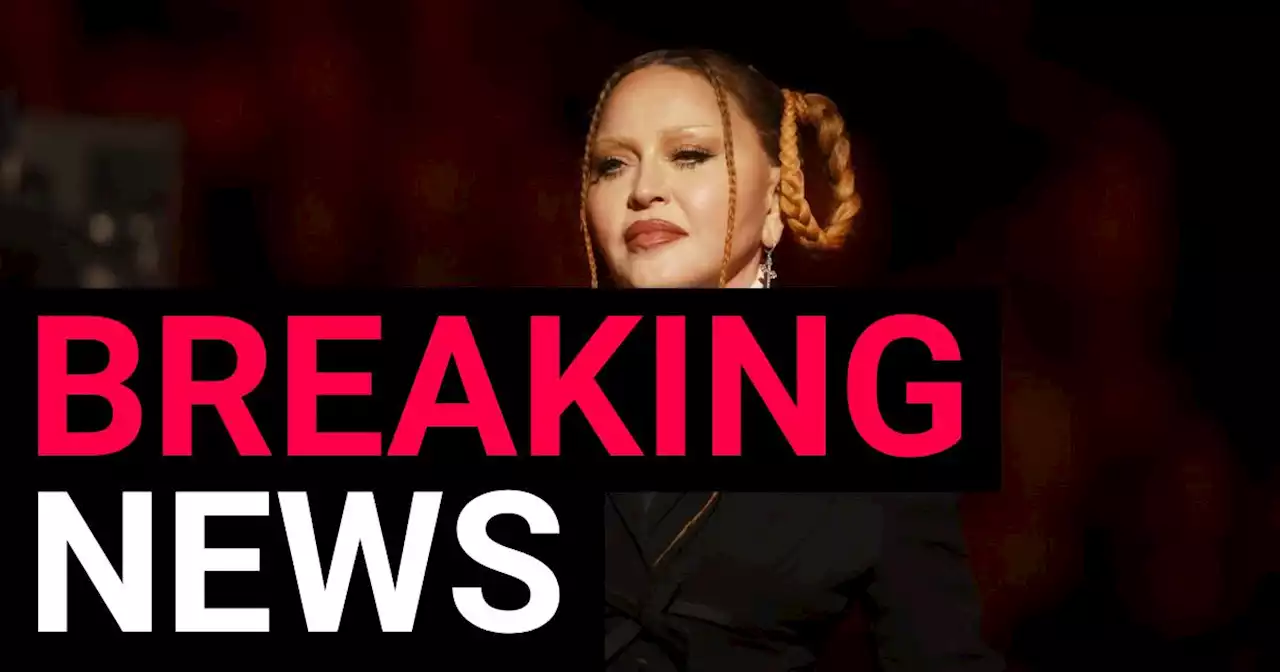 Madonna postpones tour after 'intensive care stay with serious infection'