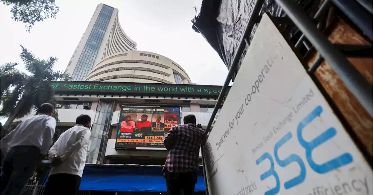 Indian shares hit record highs; Nifty closes a notch below 19,000