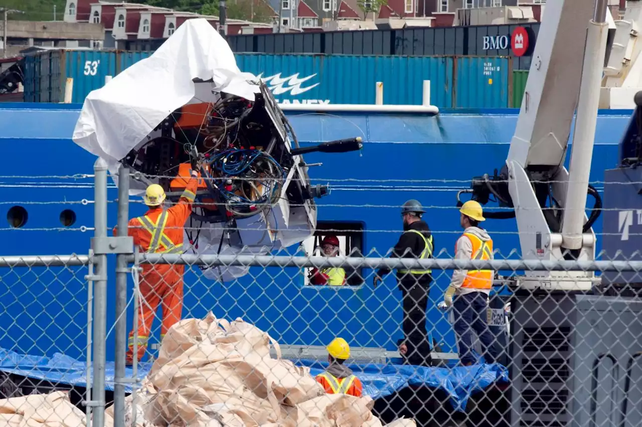 Debris of Titan submersible brought ashore as investigators probe implosion that killed five