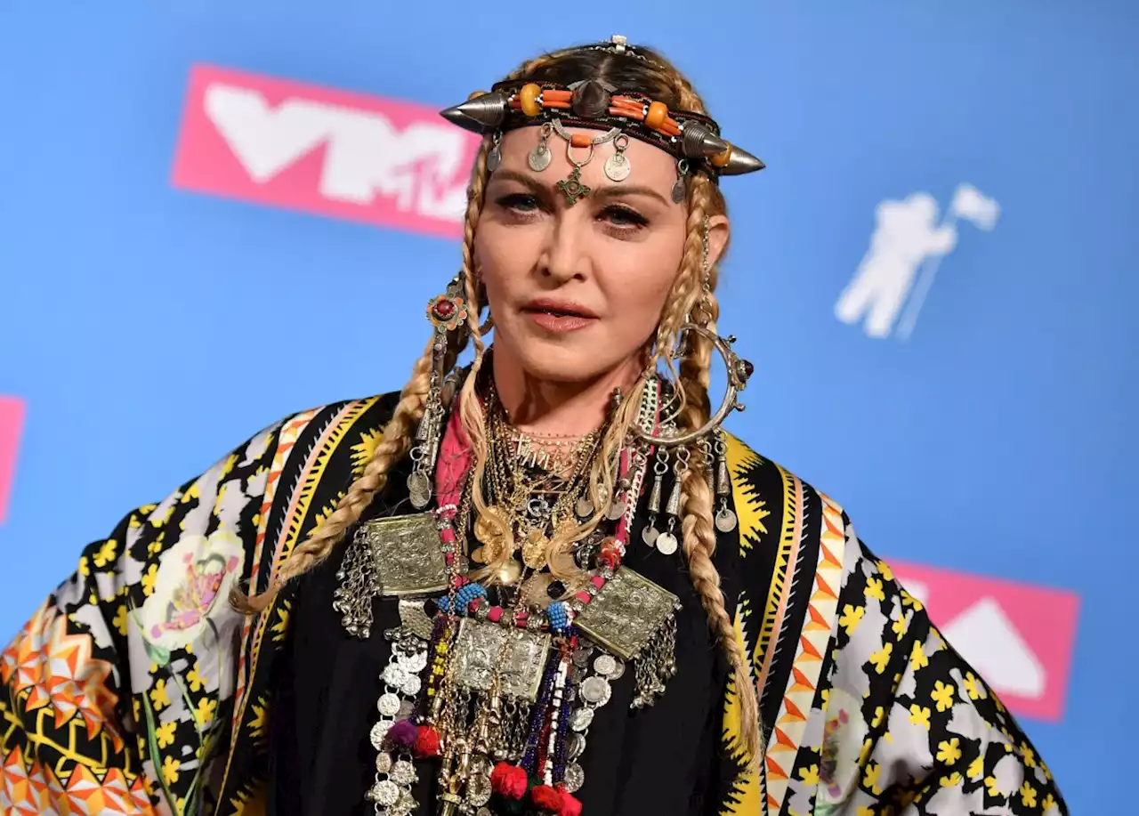 Madonna reportedly pauses tour after spending 'days' in intensive care with bacterial infection