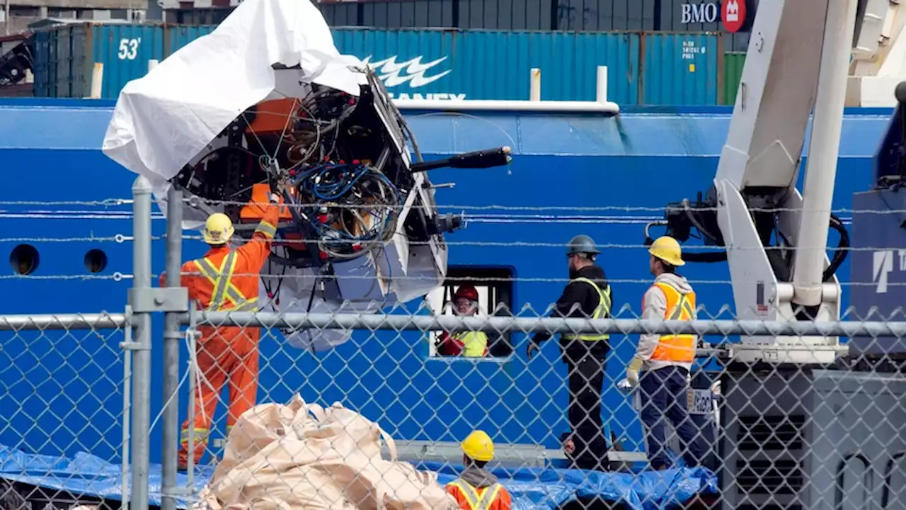 'Presumed' human remains recovered inside debris from imploded Titan submersible as wreck parts returned to shore