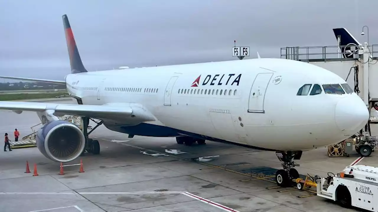 Delta flight diverted to Atlanta due to unruly passenger, airline says | CNN