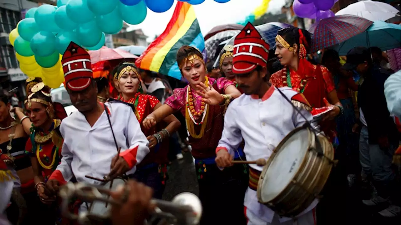 Same-sex couples and LGBTQ+ rights activists in Nepal celebrate interim court ruling