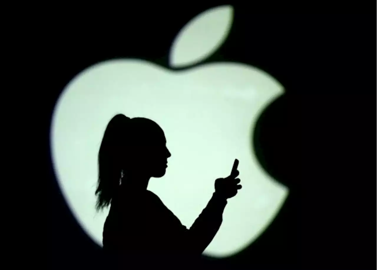 Apple stock hits record, on cusp of $3-trillion market value