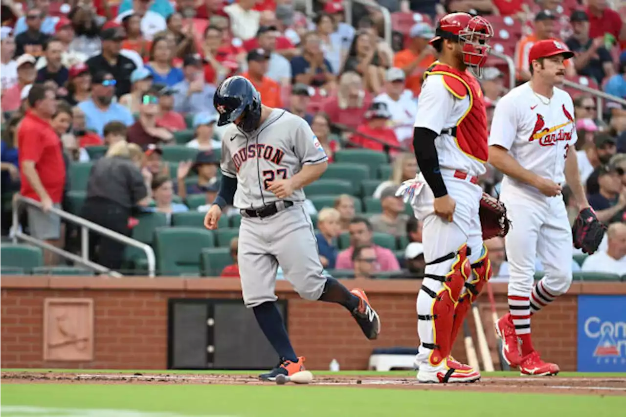 Altuve hits 3-run homer in 5-run 8th to help the Astros beat the Cardinals 10-7