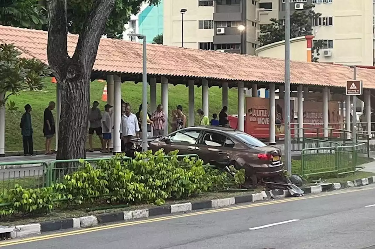 Driver taken to hospital after car skids onto grass patch in Bedok North