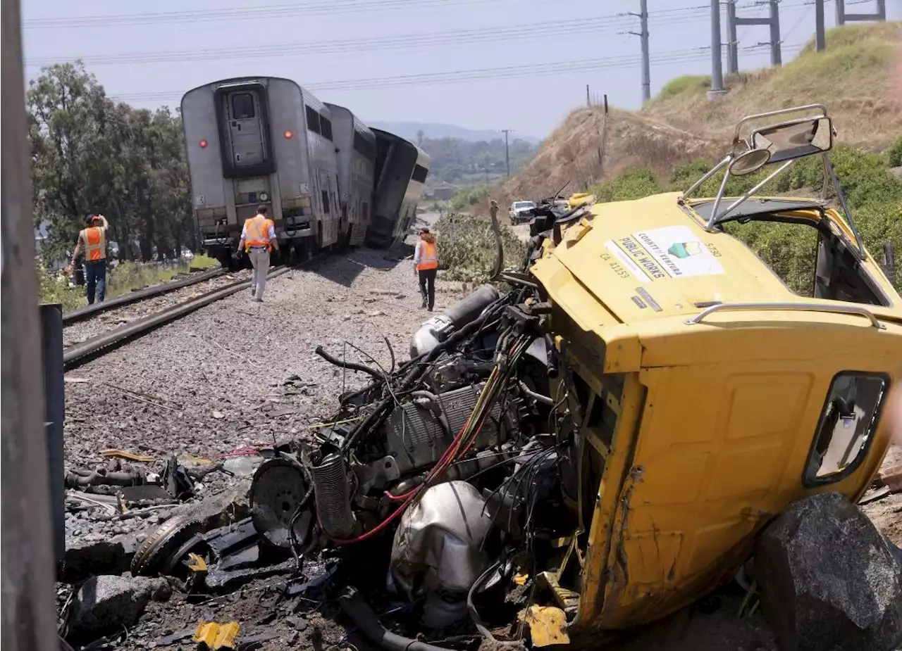 Amtrak train with 198 passengers derails after hitting truck on tracks in Southern California