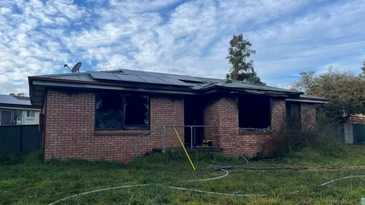 Woman dead, children rushed to hospital after NSW house fire