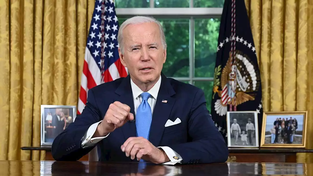 Biden signs debt ceiling bill that pulls US back from brink of unprecedented default