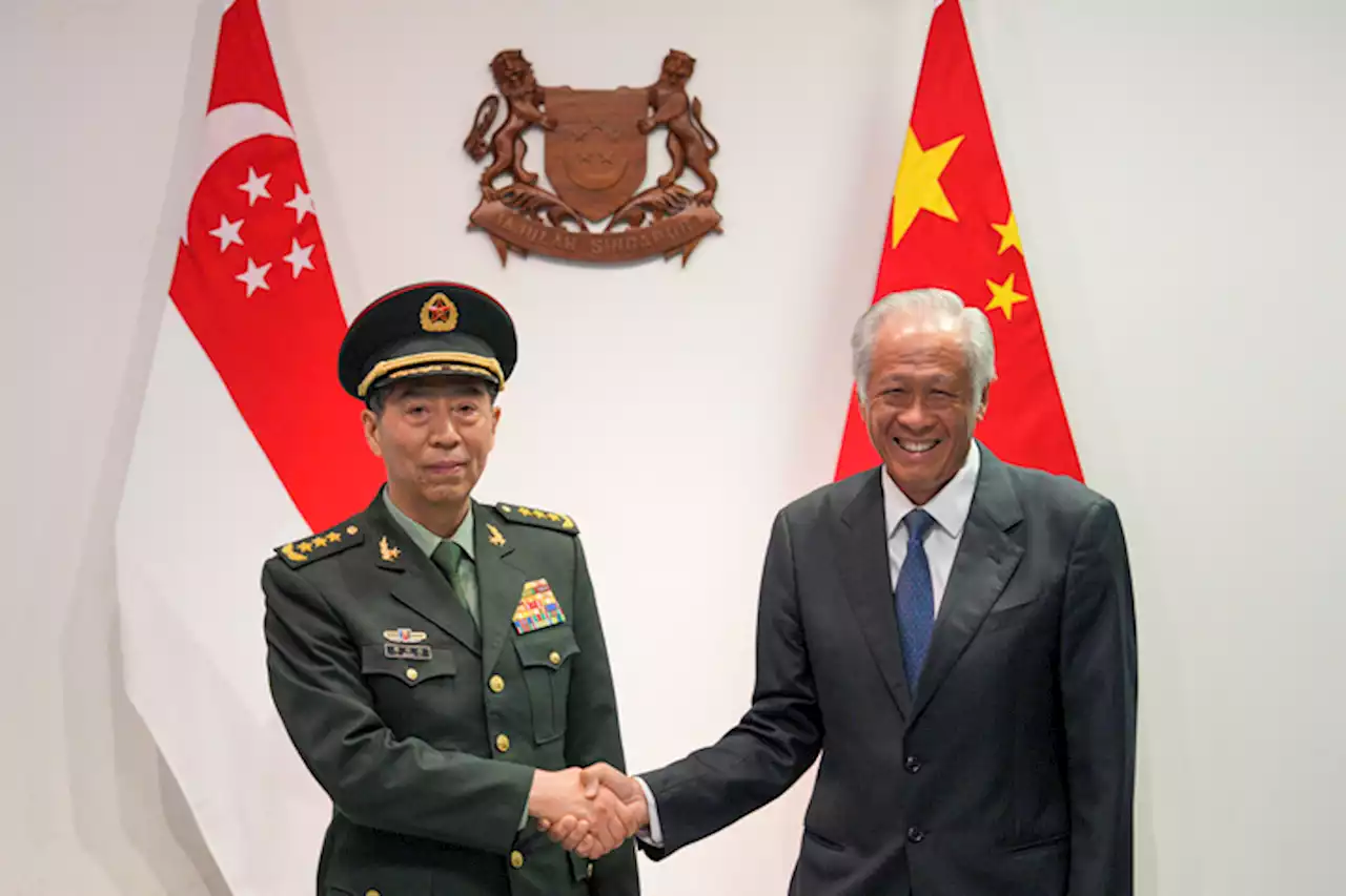 Top American, Chinese defense officials vie for influence in Asia-Pacific | David Rising / The Associated Press