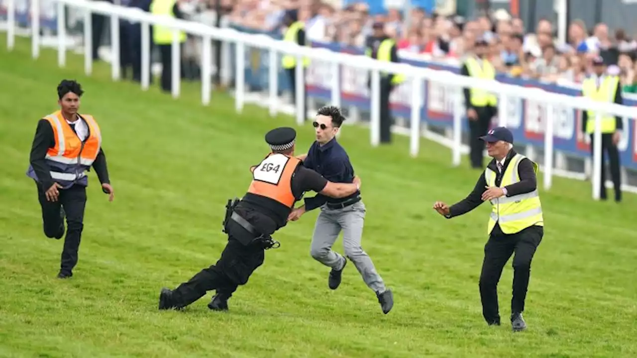 Police make 31 arrests as animal rights protesters plan to disrupt Epsom Derby | CNN