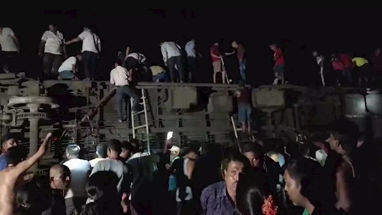 At least 207 killed and 900 injured in three-train crash in India | CNN