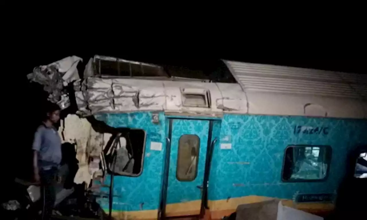 At least 207 killed and 900 injured in three-train crash in India