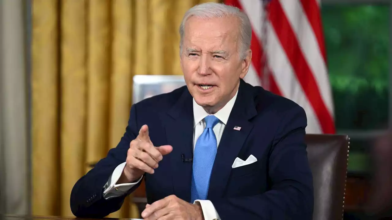 Biden signs debt limit bill into law, averting first-ever U.S. default