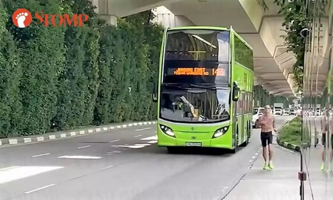 Shirtless man still jogs dangerously along Pasir Panjang Road, this time blocking a bus