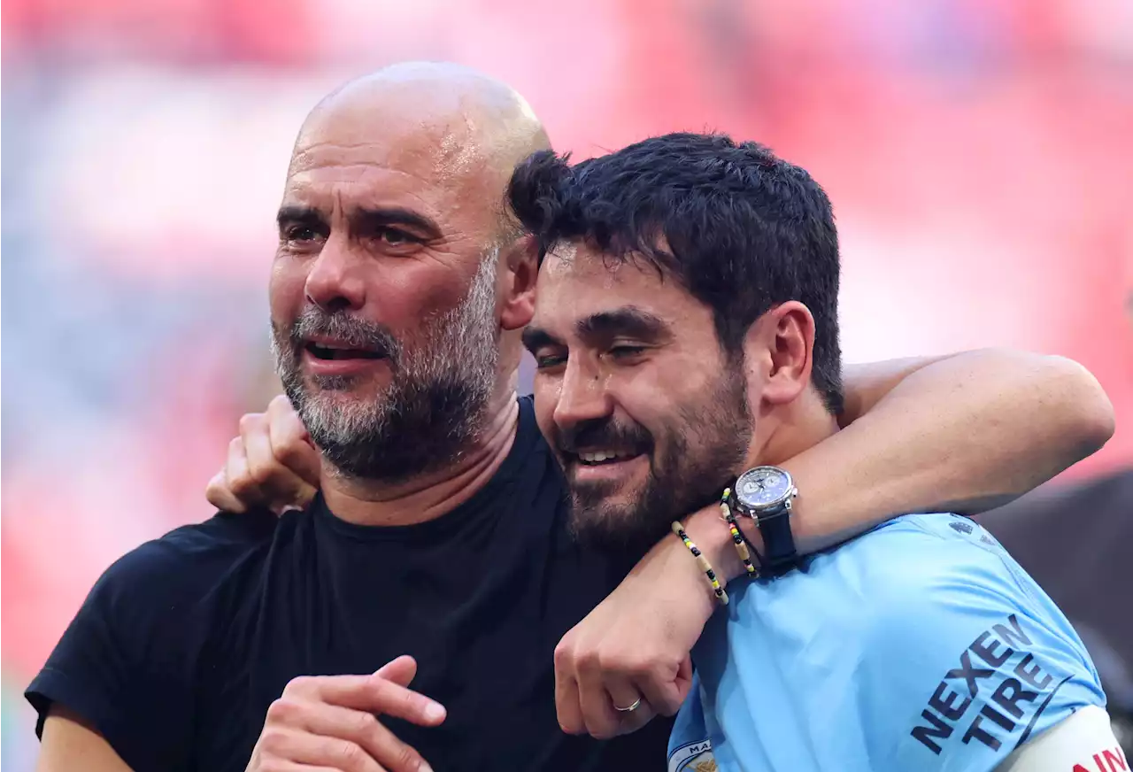 Gundogan and Guardiola pictured in tears after Man City's historic FA Cup final win