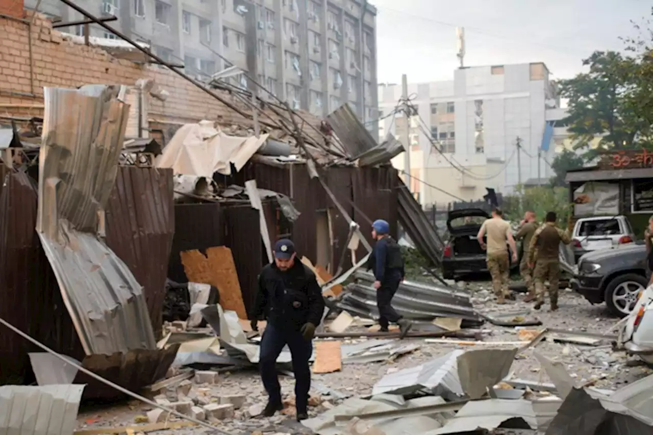 Russian missile kills 11 in pizza parlor;man accused of directing strike nabbed | Hanna Arhirova / The Associated Press