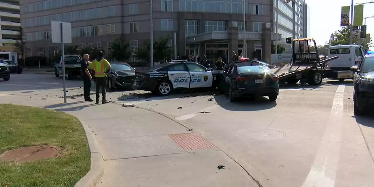 Car crashing into Cleveland Clinic Police cruiser, pedestrians caught on camera