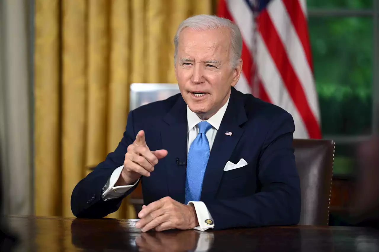 Biden signs debt ceiling bill that pulls US back from brink of unprecedented default