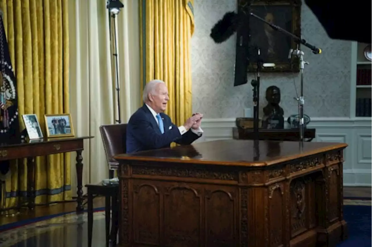 Biden signs debt limit bill, avoiding US default