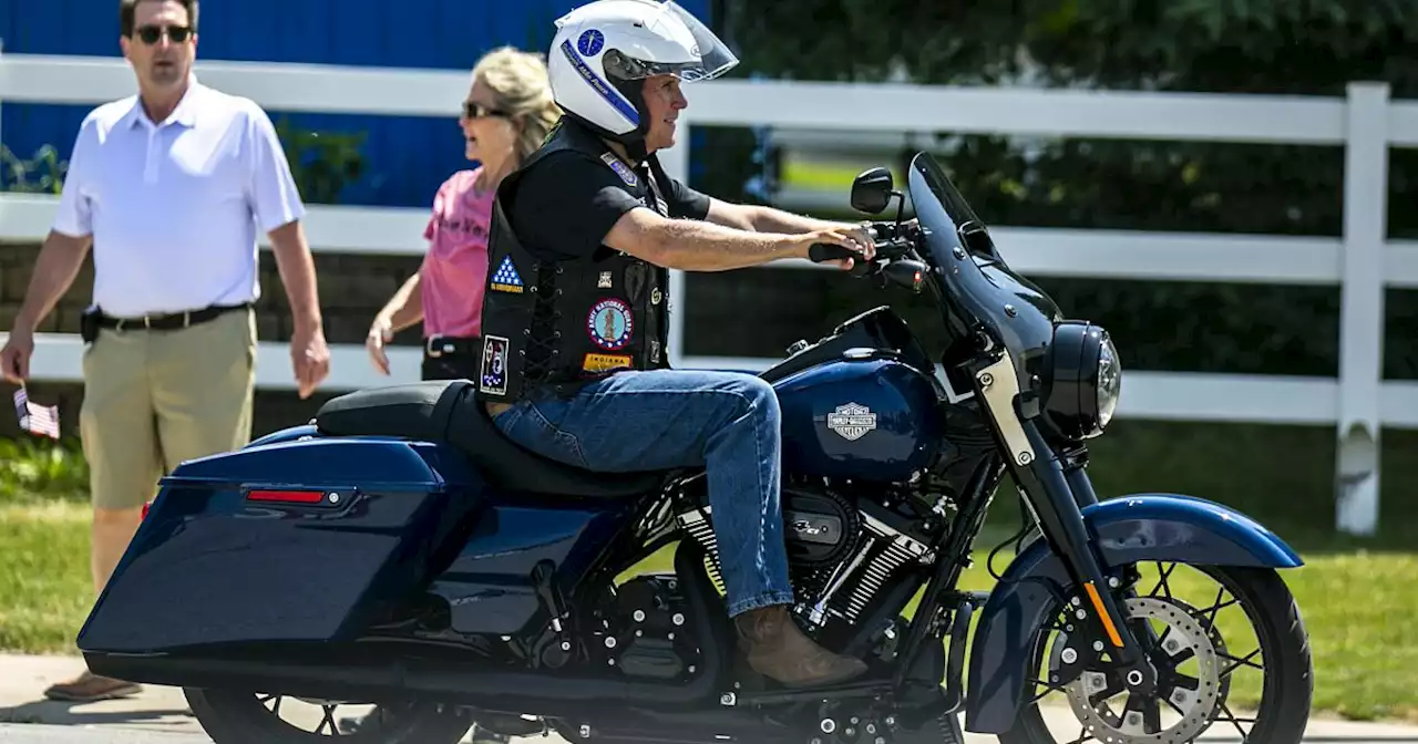 DeSantis signs Bible, Pence hops on motorcycle at 'Roast and Ride' rally in Iowa