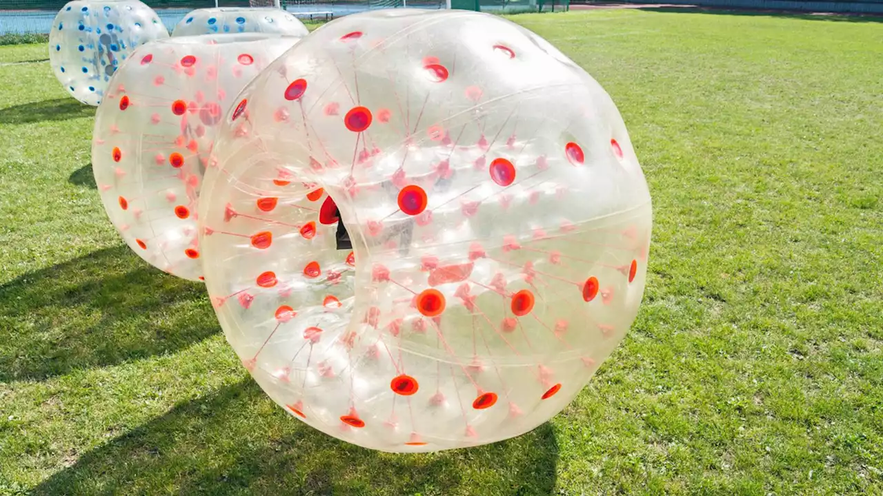 Boy, 9, seriously injured after inflatable zorb ball blown off lake in Southport park