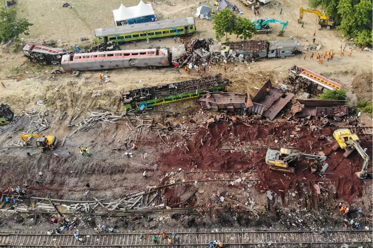 Indian officials search for answers after train crash kills at least 288