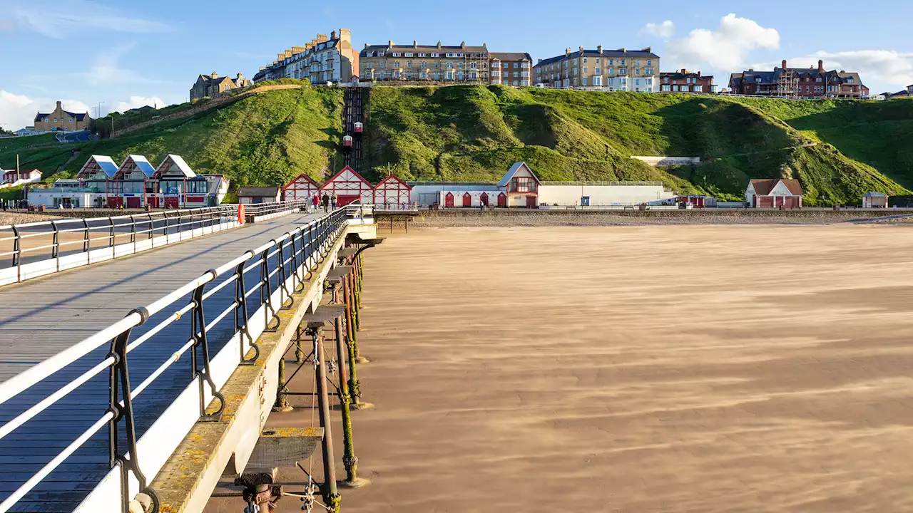 Body of woman pulled from the sea after being spotted by passerby