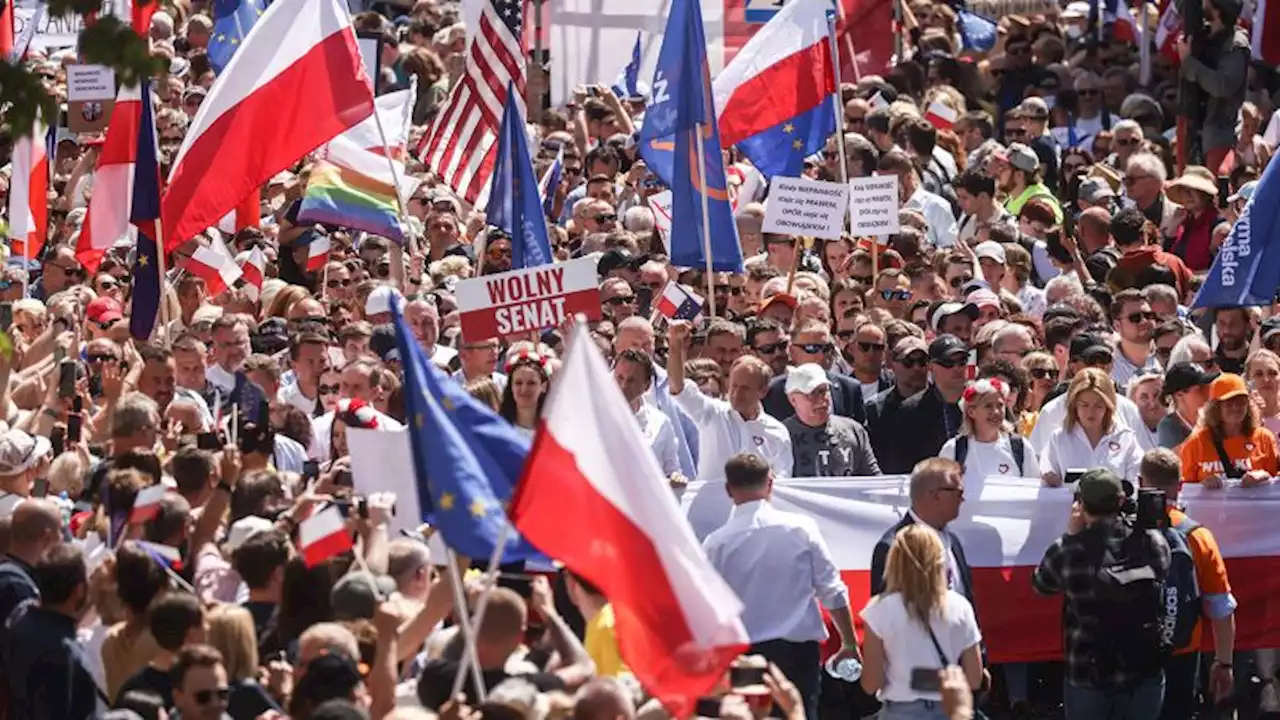 Poland's opposition brings hundreds of thousands onto streets to protest against nationalist government | CNN