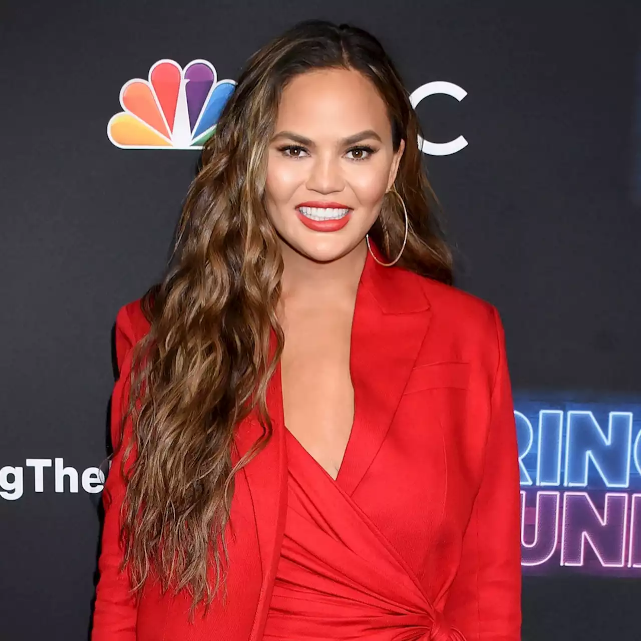 Chrissy Teigen Believed She Had an Identical Twin After 'Insane' DNA Test Mishap - E! Online