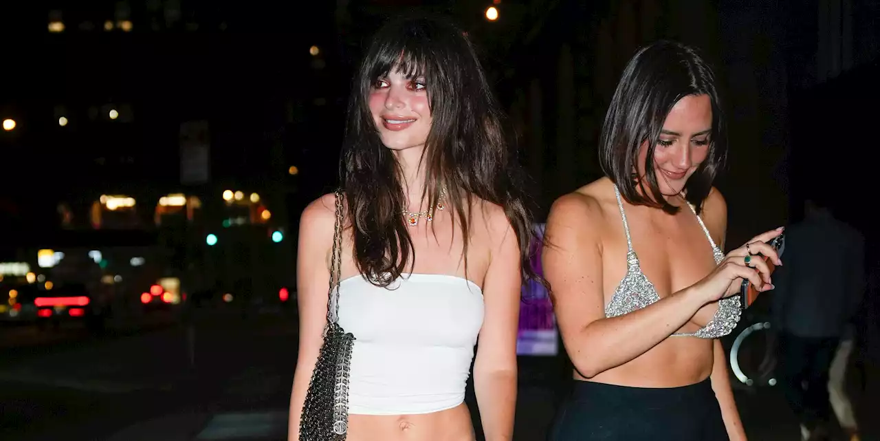 Emily Ratajkowski Parties in a White Tube Top and Low-Rise Rainbow Pants