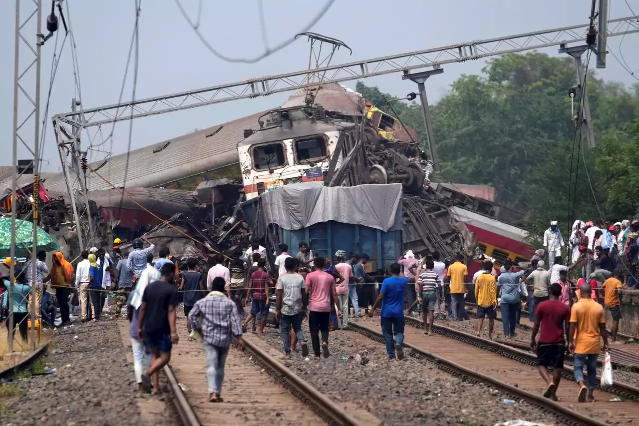 As India grieves train crash that killed 275, relatives wait for bodies of loved ones