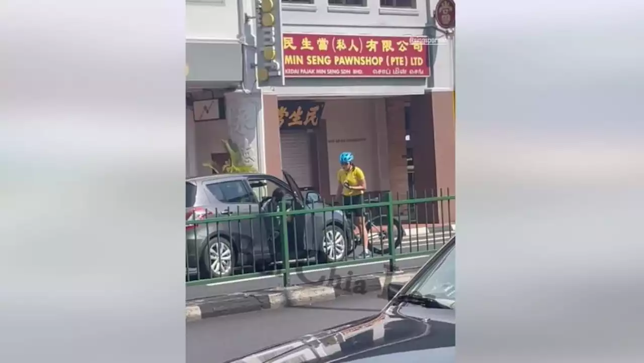 Car drives off with cyclist on bonnet after alleged altercation in Katong, 2 women assisting in police probe